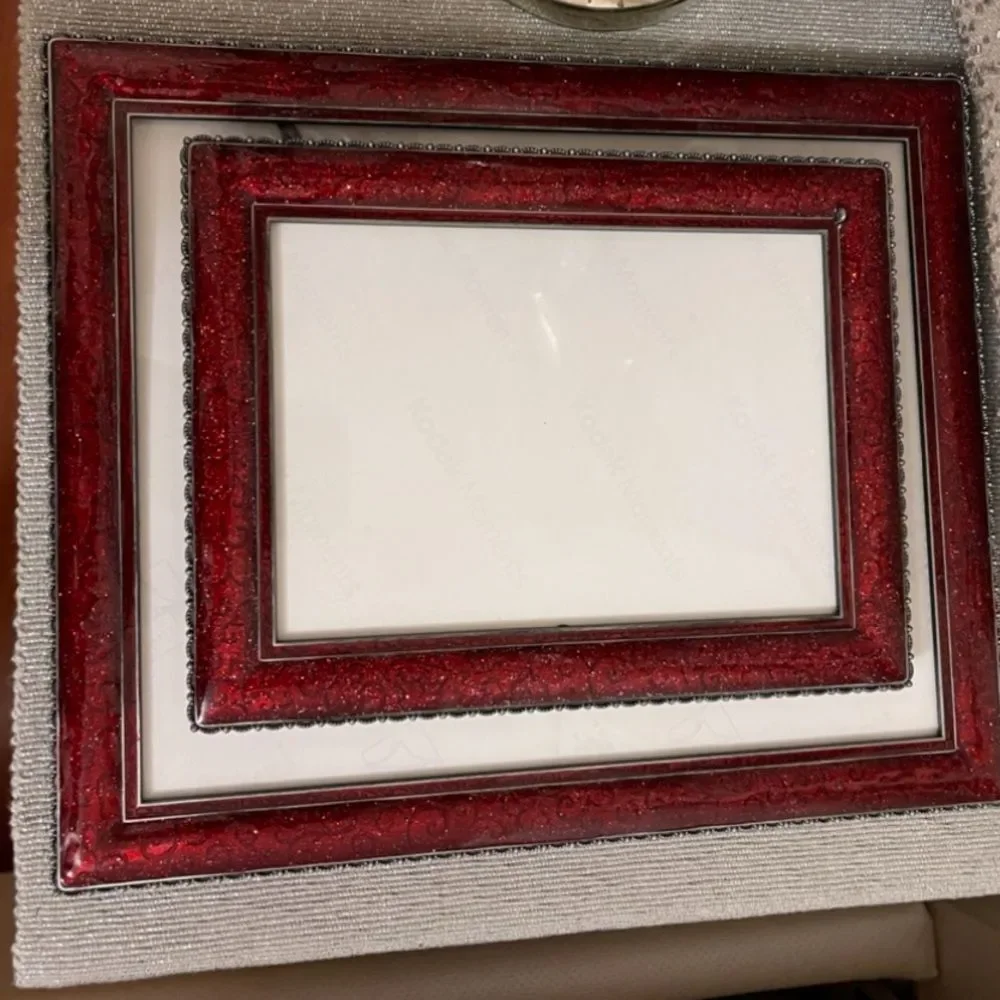Three burgundy frames